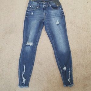 Distressed skinny jeans